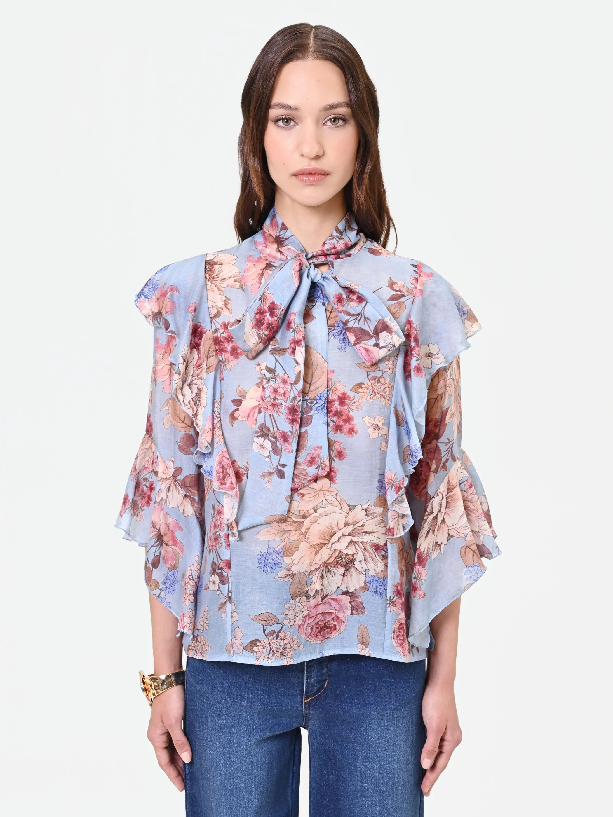 Blusa azzurra con fantasia floreale e fiocco - Image 2