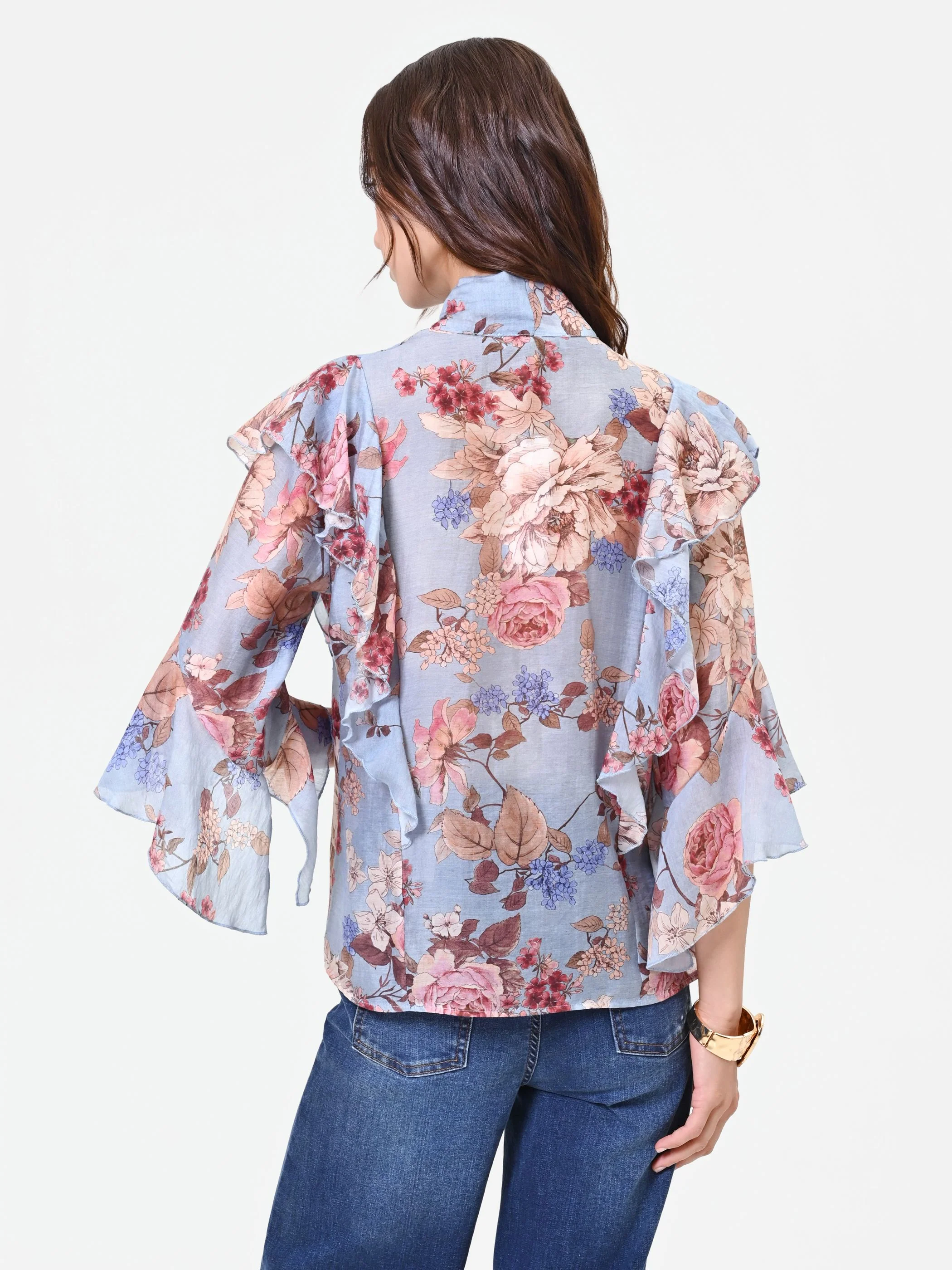 Blusa azzurra con fantasia floreale e fiocco - Image 3