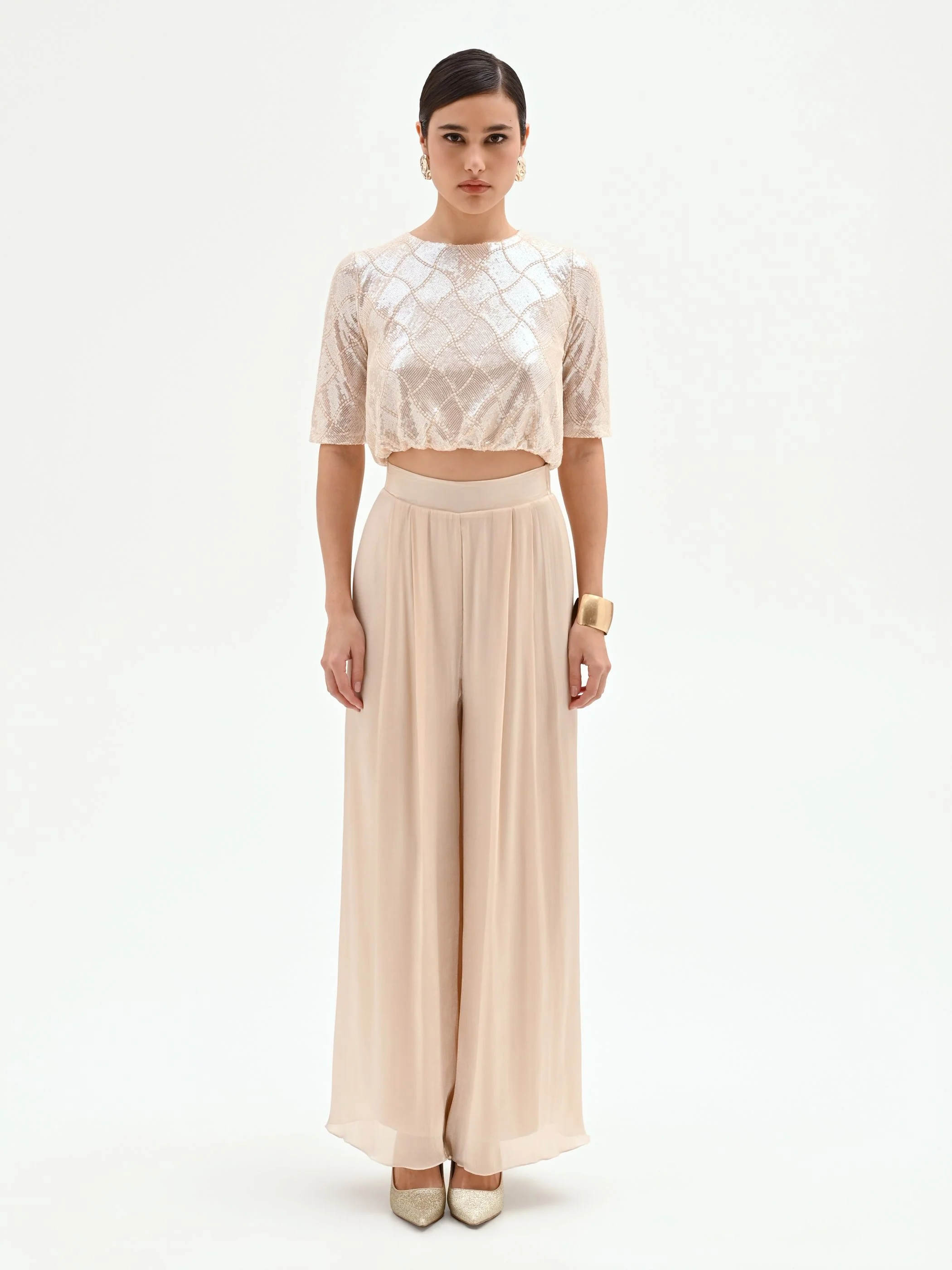 Crop top beige chiaro con paillettes