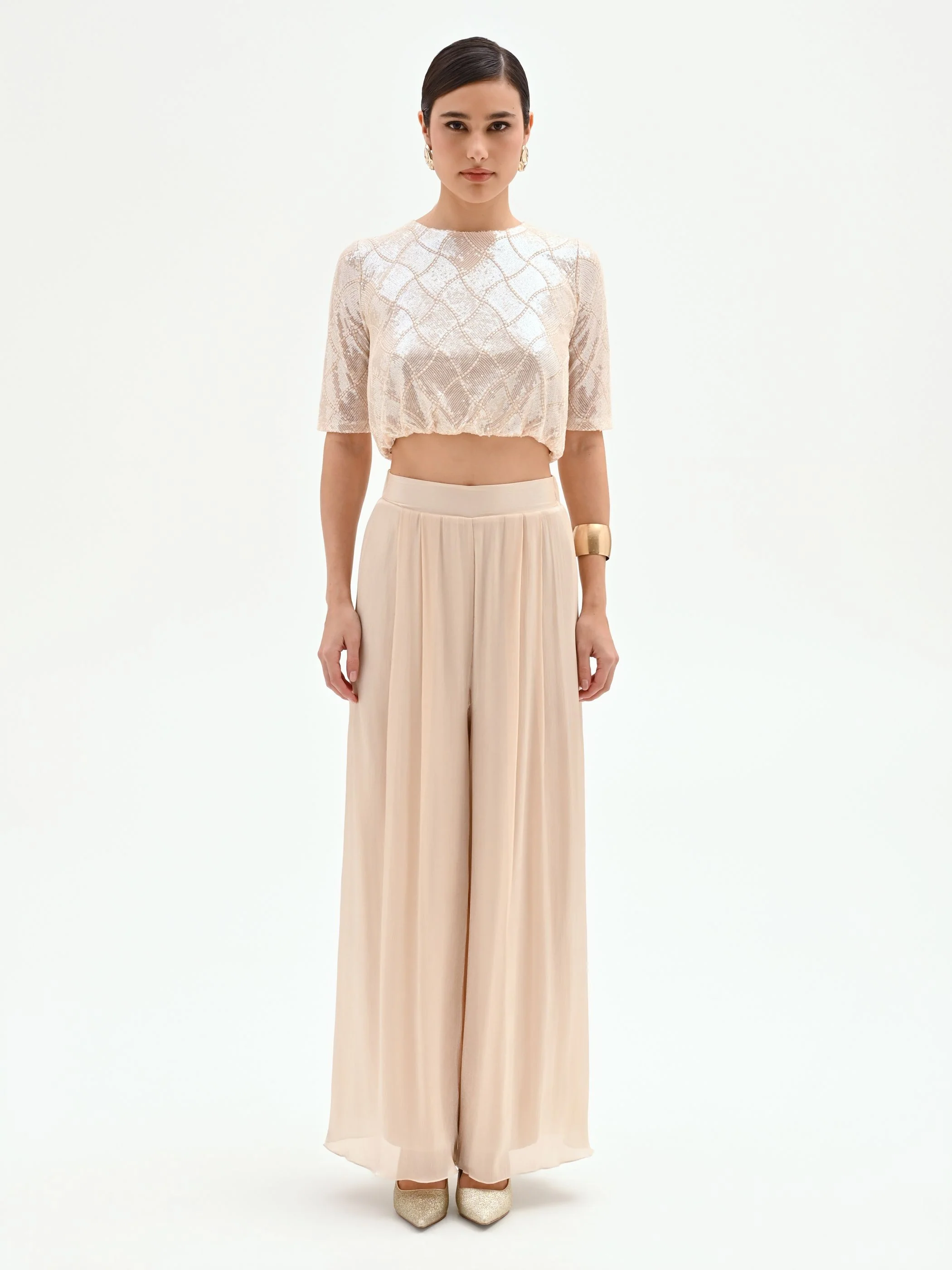 Pantalone a palazzo beige chiaro in raso cangiante