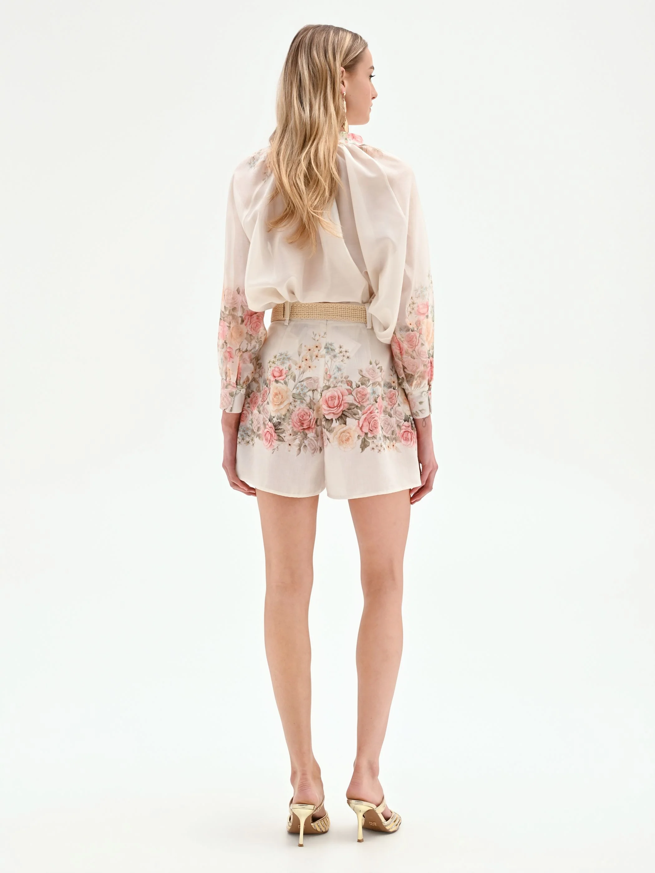 Pantalone shorts bianco a fantasia floreale