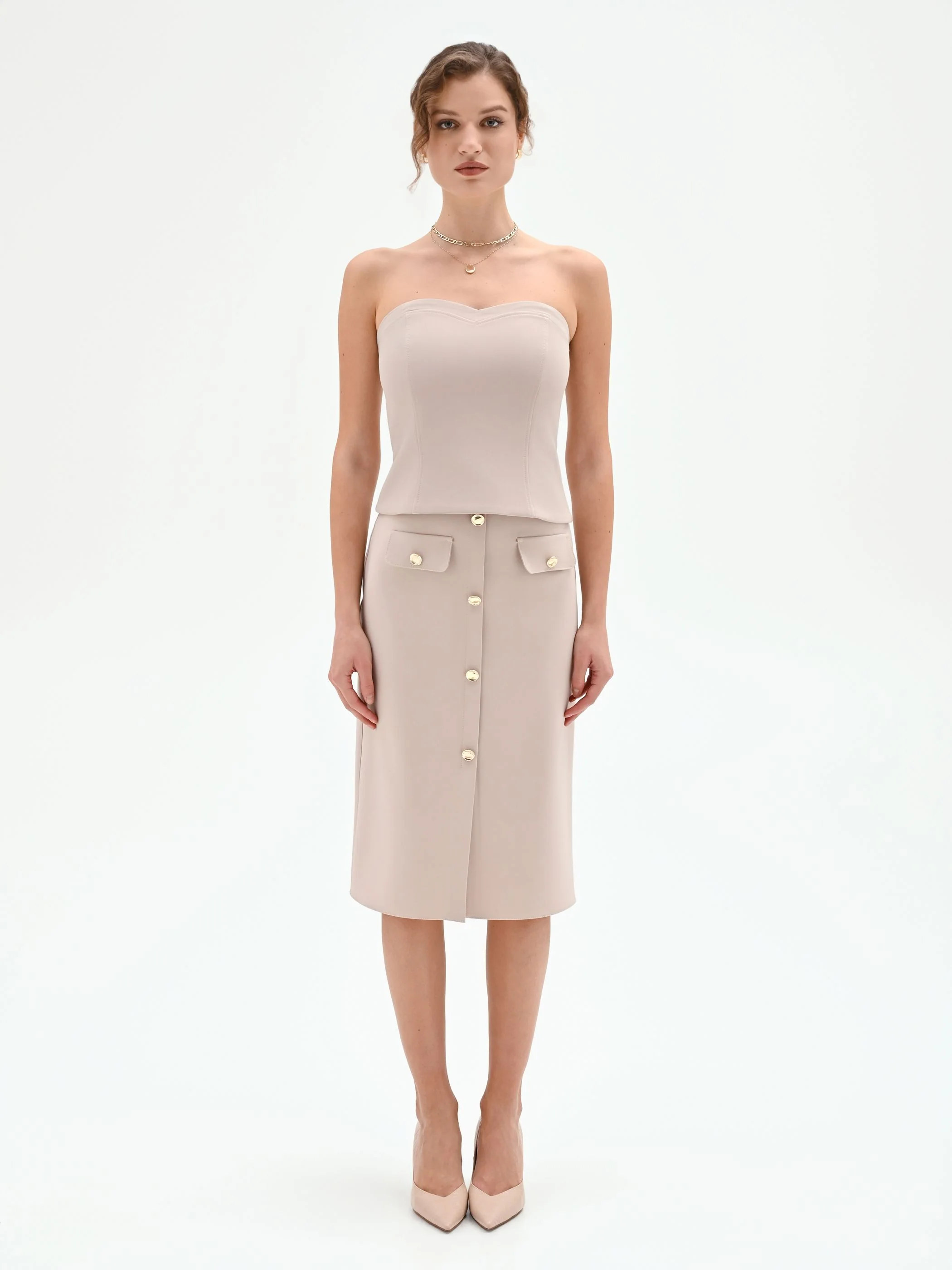 Top Studio beige a cuore con impunture