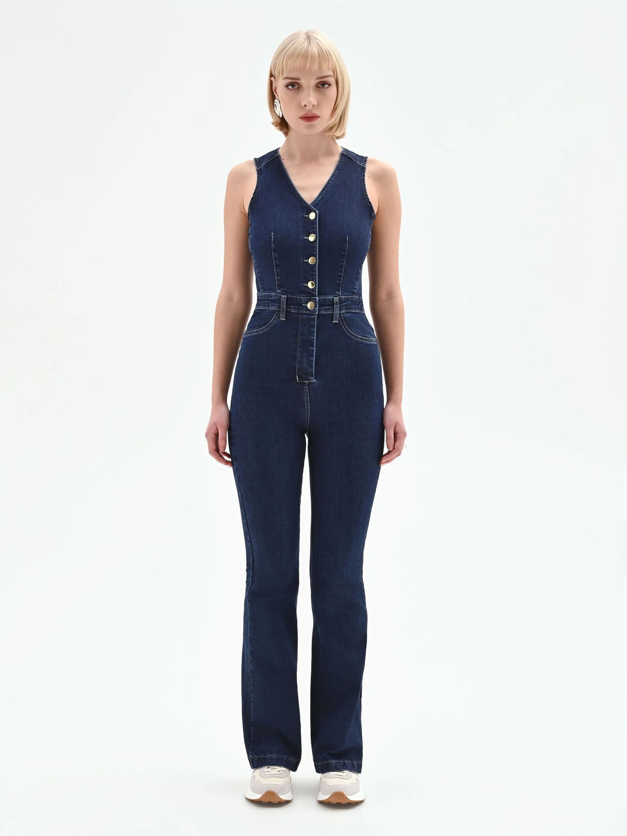 Tuta lunga in denim blu navy con bottoni a vista